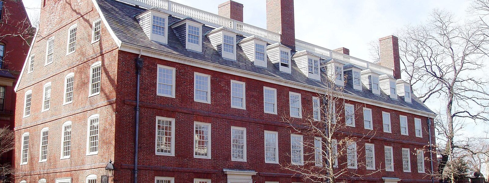 The red-brick facade of Massachusetts Hall in Harvard Yard