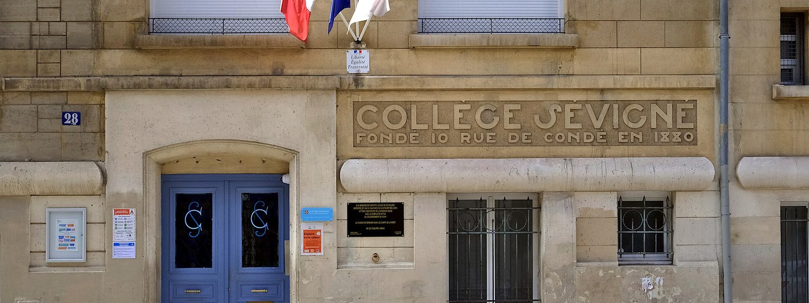 The façade of Collège Sévigné, 28 rue Pierre-Nicole, with its engraved lettering and blue door